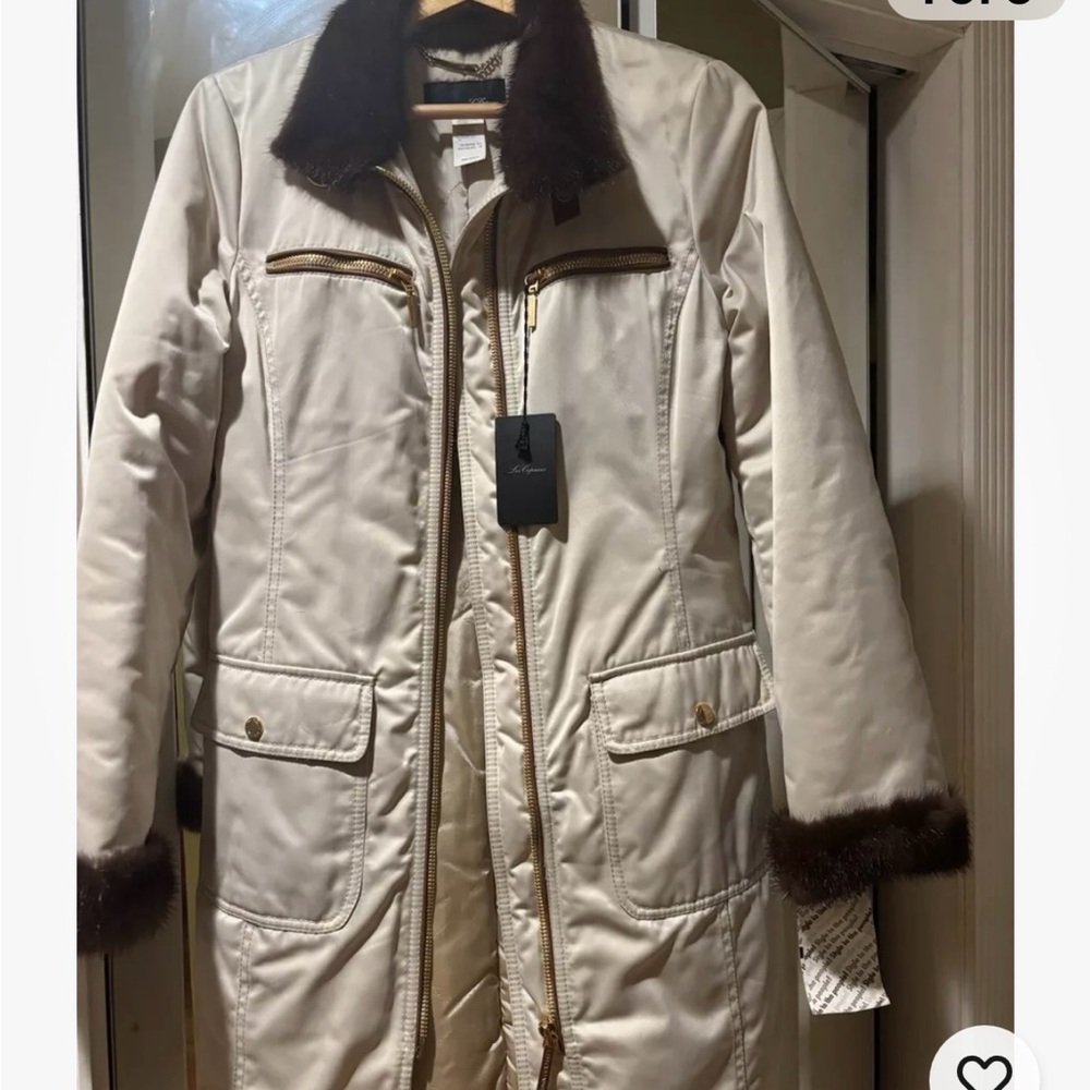 Les Copains coat. insulated w/ leather & fur trim. Knee length. Ivory/crème